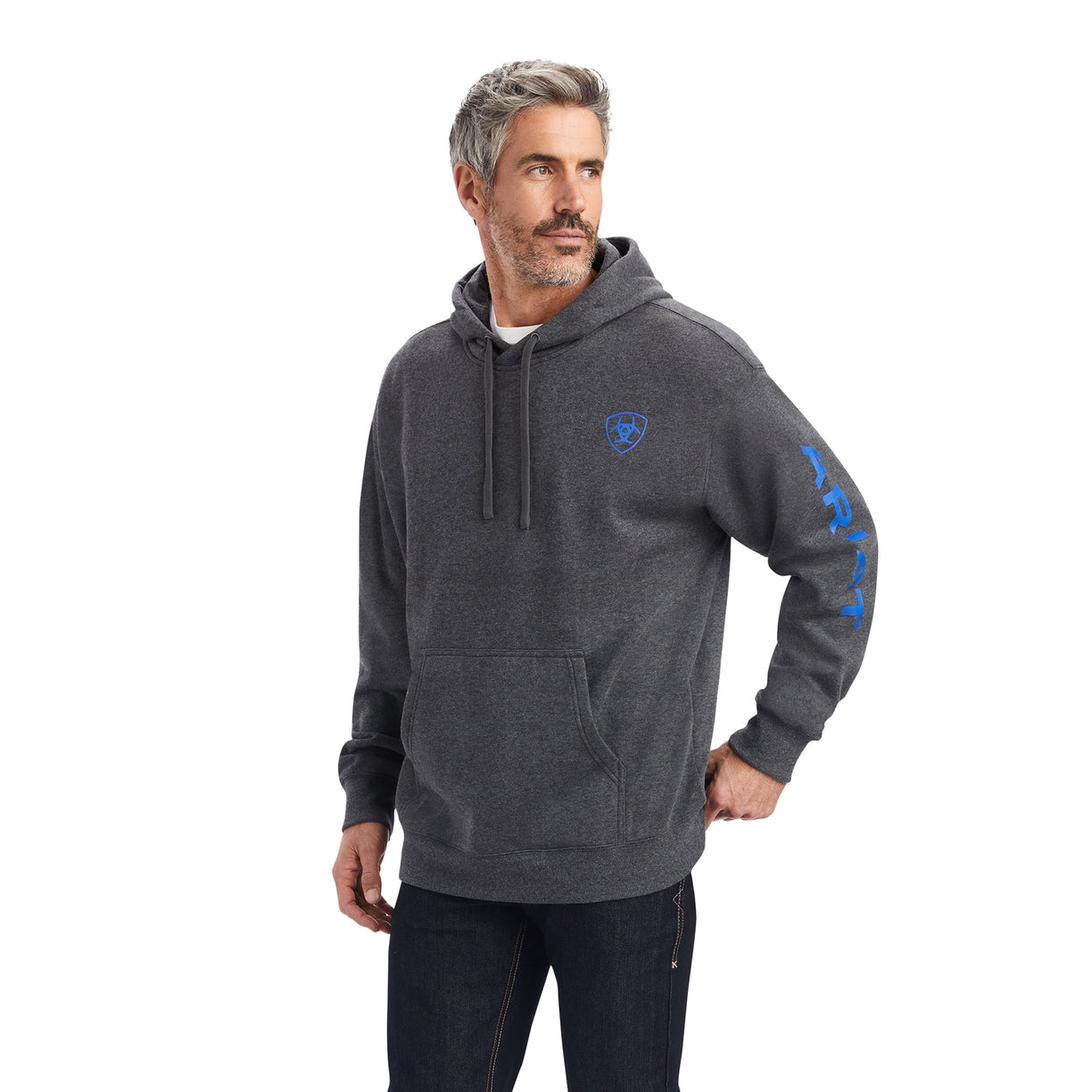 Man wearing a gray hoodie with a logo on a white background