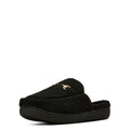 Black slipper with a fuzzy texture on a white background