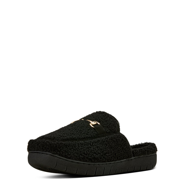 Black slipper with a fuzzy texture on a white background