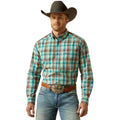Man wearing a plaid shirt, jeans, and a cowboy hat on a white background
