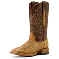 Brown and beige cowboy boot with intricate design on a white background