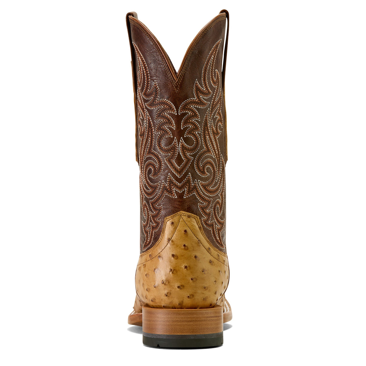 Brown cowboy boot with intricate design on a beige background