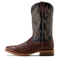Brown cowboy boot with intricate stitching on a white background