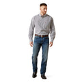 Man wearing a patterned shirt, jeans, and shoes on a white background