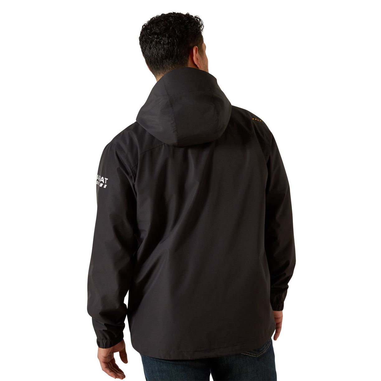 Person wearing a black jacket with a visible brand logo on the sleeve against a white background