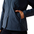Navy blue jacket with a brown leather patch on a white background