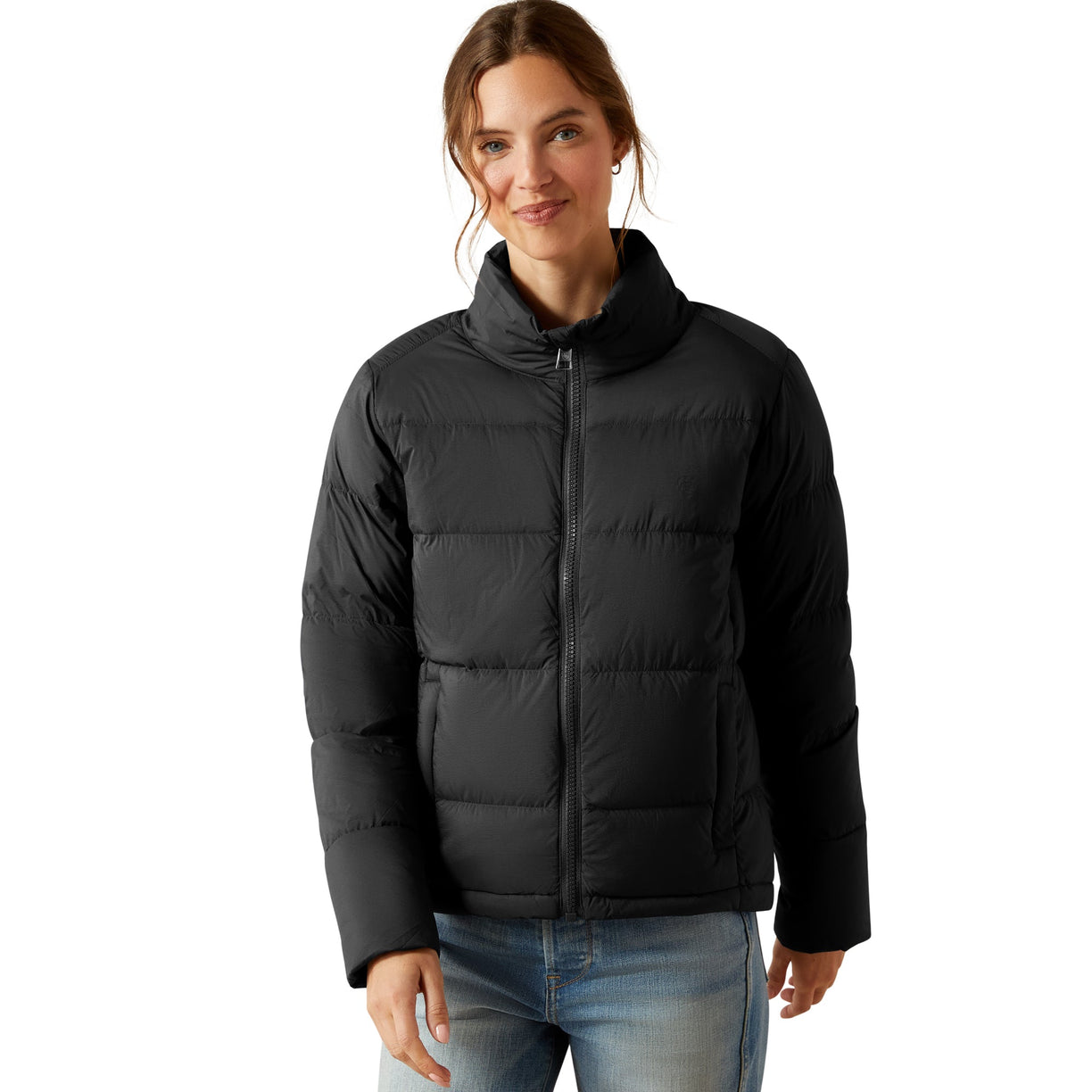 Woman wearing a black puffer jacket on a white background