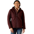Woman wearing a maroon jacket with a white background