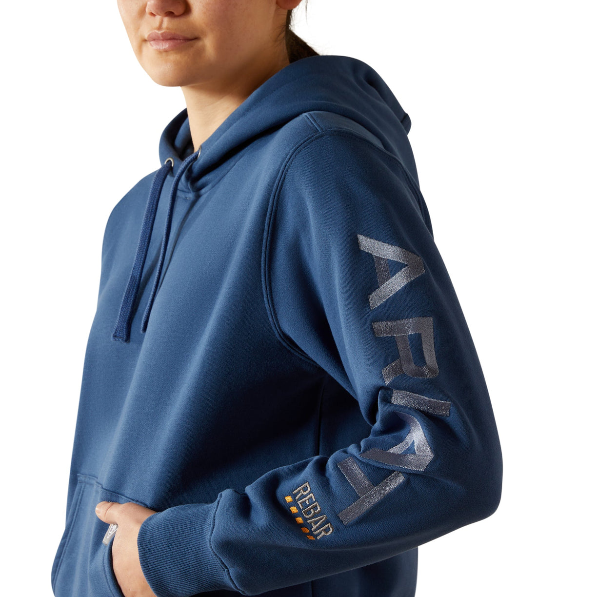 Person wearing a blue hoodie with 'Repair' branding on a white background