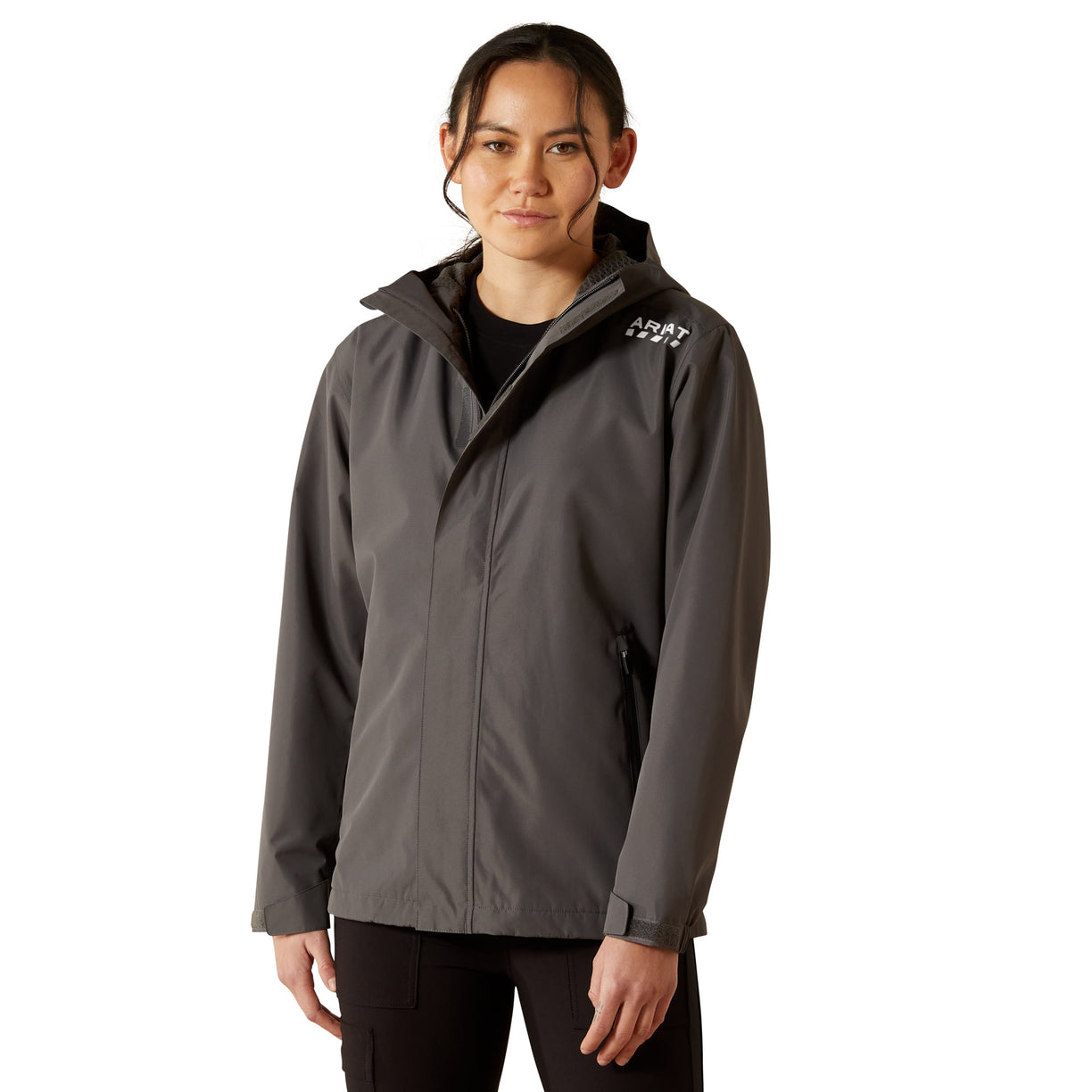 Person wearing a gray jacket on a white background