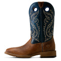 Brown cowboy boot with blue uppers and intricate stitching on a white background
