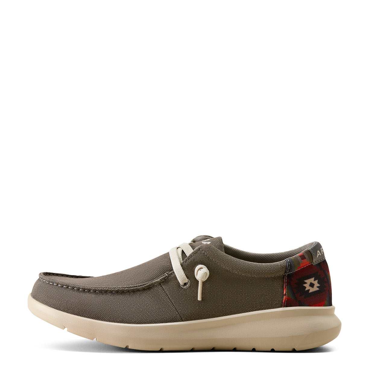 Grey casual shoe with a white sole on a white background