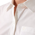 Close-up of a white shirt with a collar and buttons.