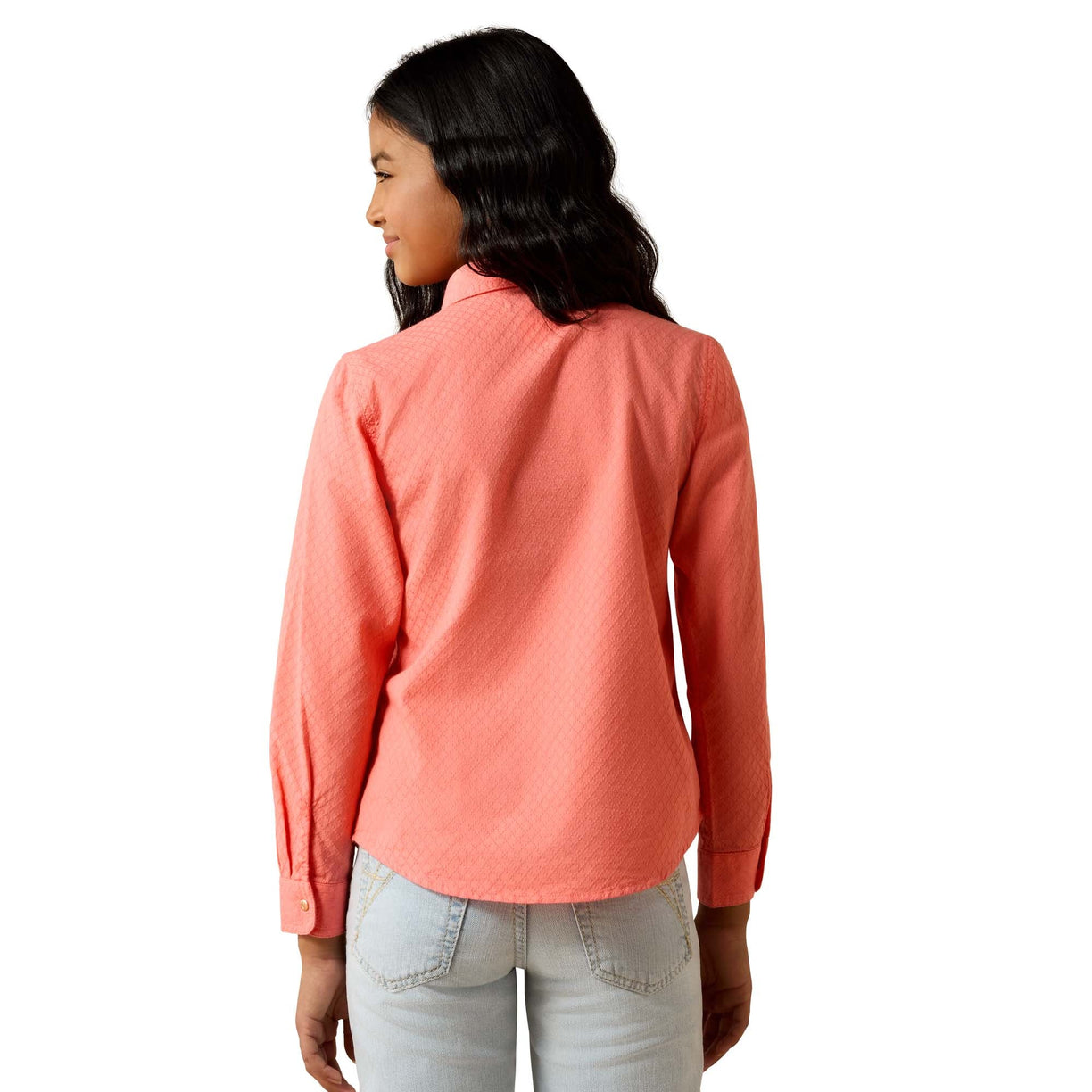 Woman wearing a coral long-sleeve shirt on a white background