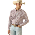 A man wearing a western long-sleeve button-up shirt with vertical red and white stripes, paired with a beige cowboy hat, light blue jeans, and a brown leather belt with a large silver buckle, set against a plain white background.