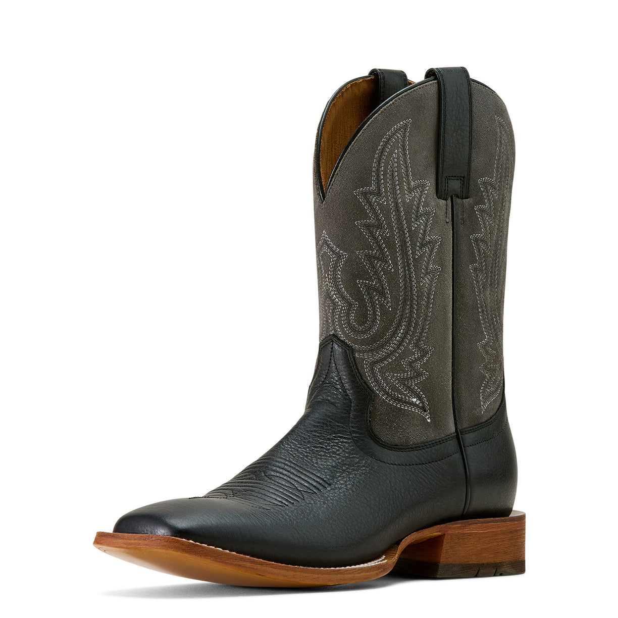 Black cowboy boot with brown sole on a white background