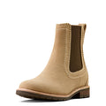 Beige boot with brown sole on a white background