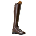 Brown riding boot on a beige background
