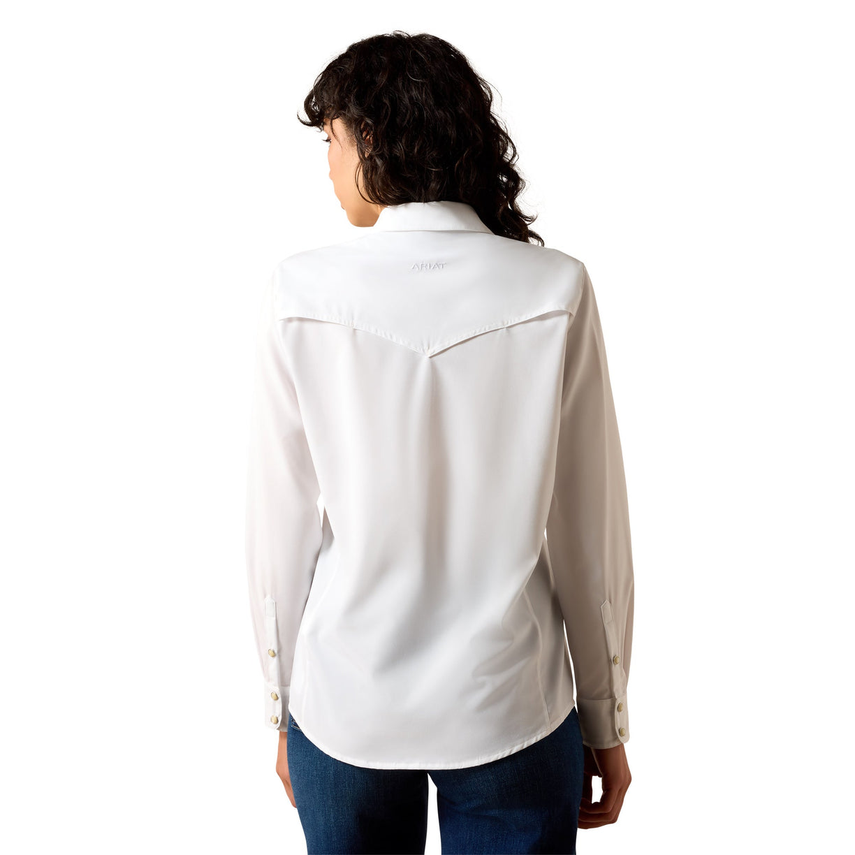 Person wearing a white shirt with a visible brand logo on a white background
