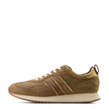 Brown sneaker with 'Ariat' branding on a white background