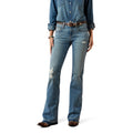 Person wearing blue jeans and a denim shirt on a white background