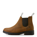 Brown leather Chelsea boot on a white background