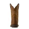 Brown cowboy boot with intricate stitching on a white background