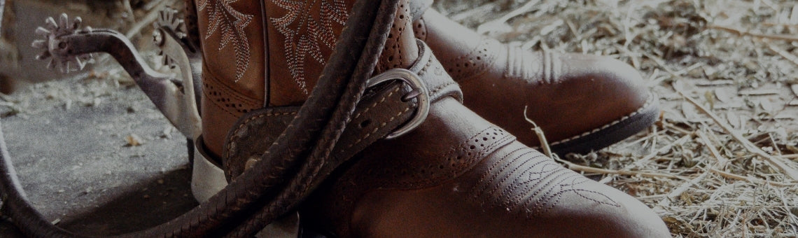 Ariat Women's Stockman Boots, close up in barn