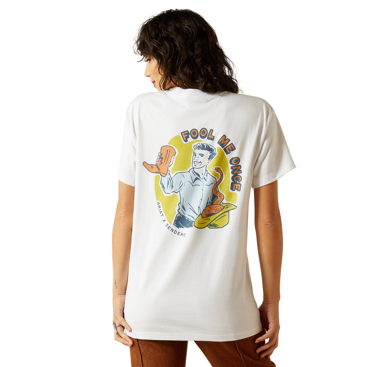 Person wearing a white t-shirt with a colorful graphic on the back, standing against a white background.