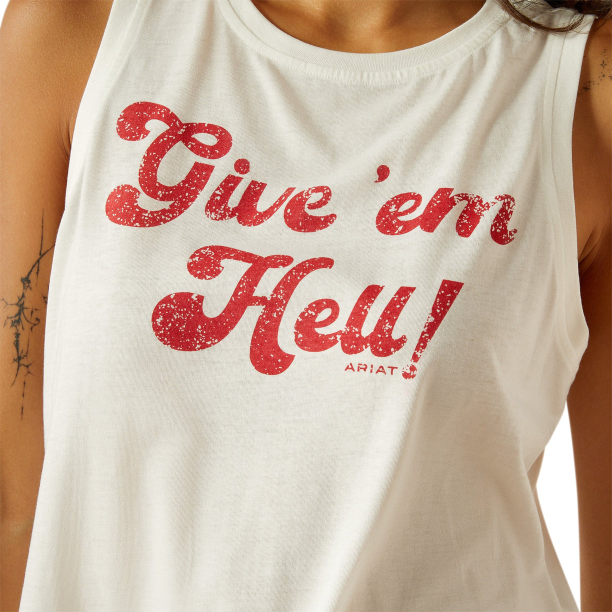 White tank top with red text 'Give 'em Hell' on a person wearing it.