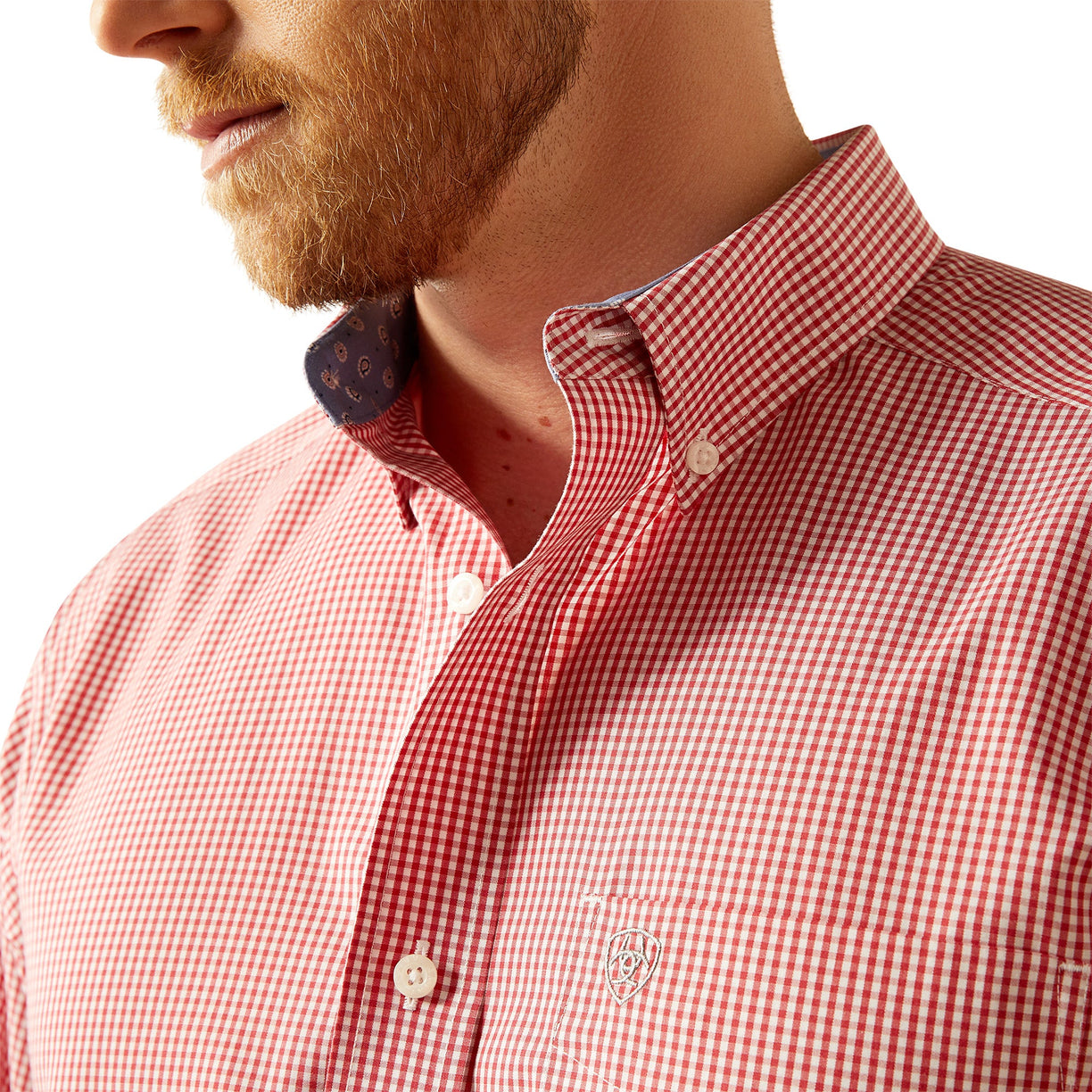 Red and white checkered shirt worn by a person