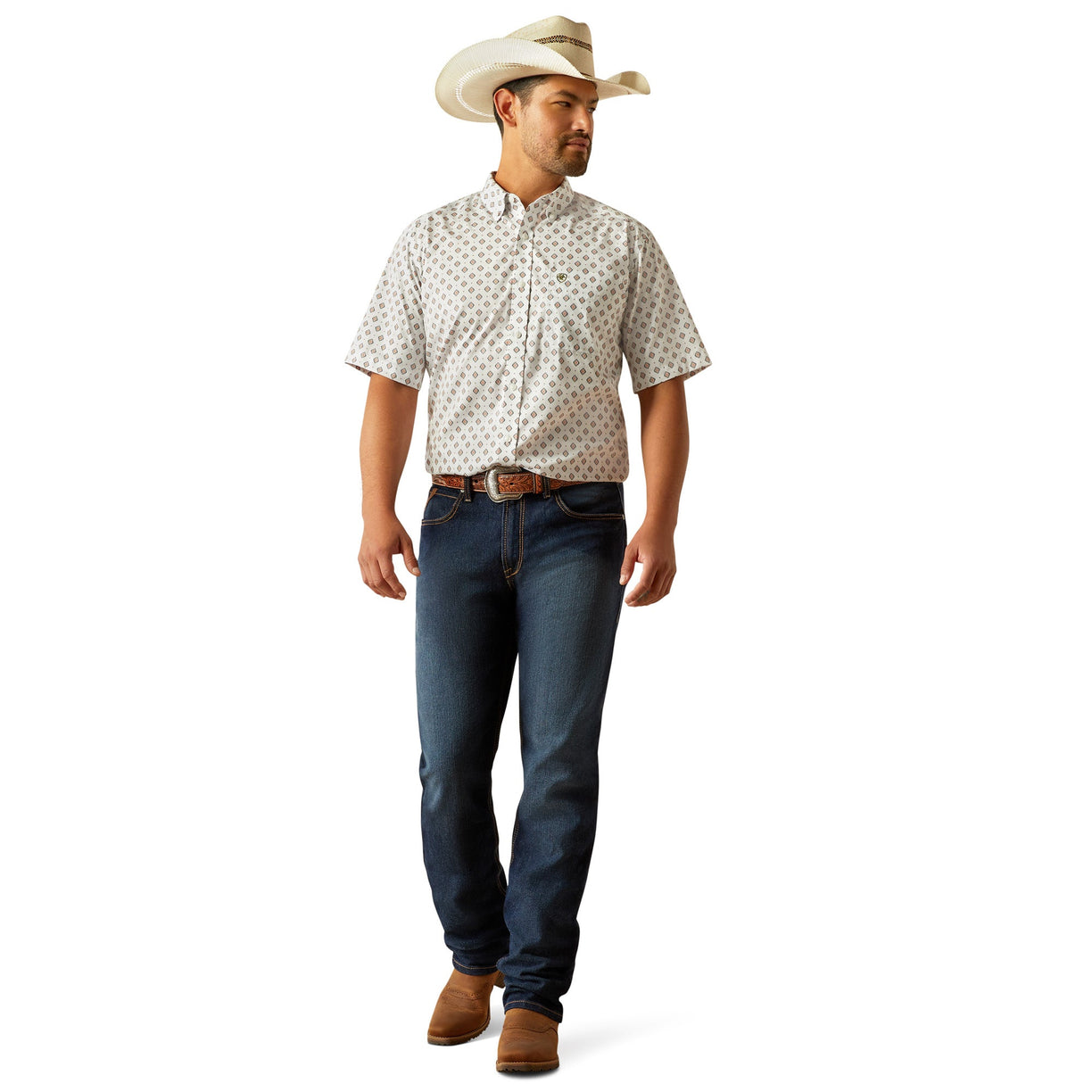 Man wearing a patterned shirt, jeans, and a cowboy hat on a white background