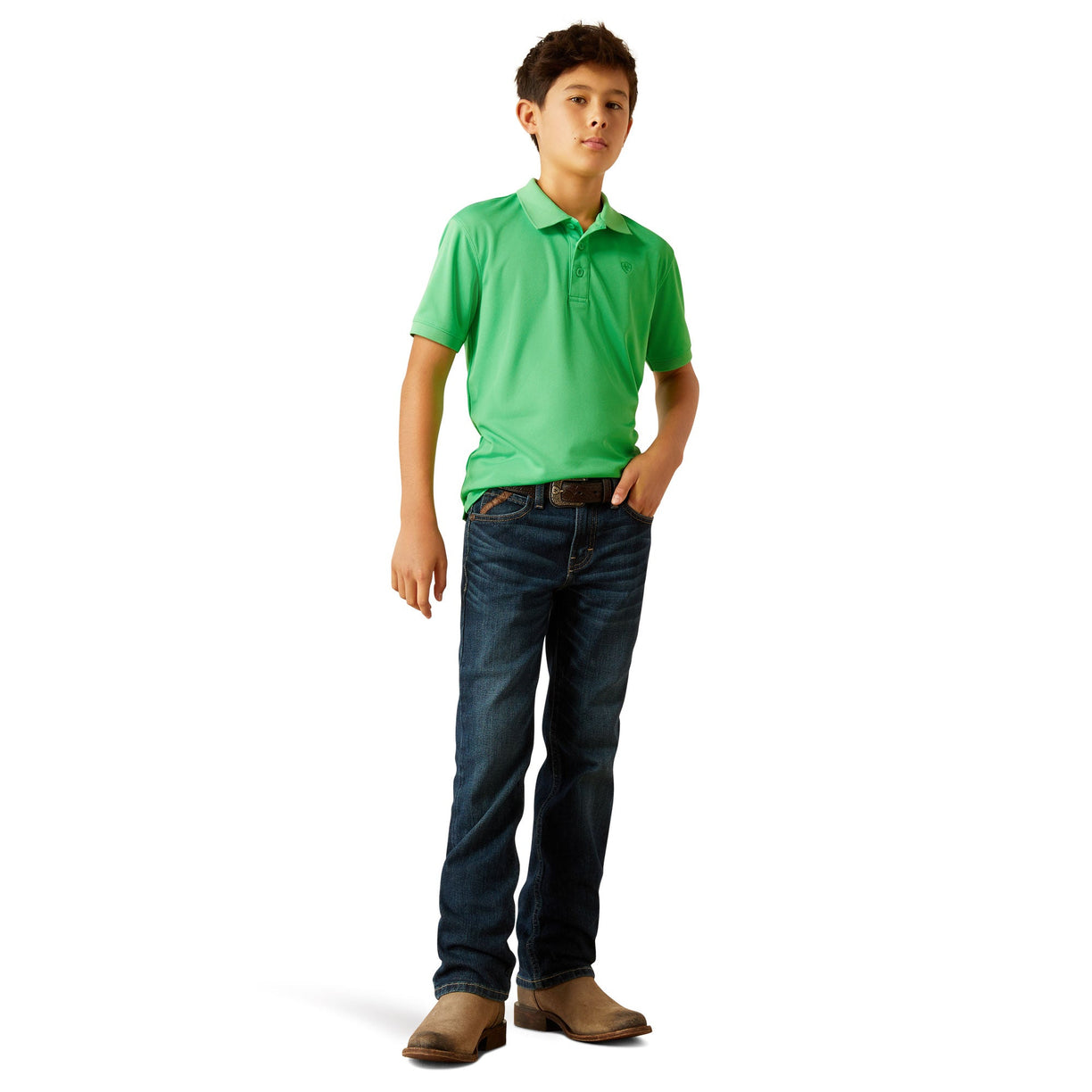 Child wearing a green polo shirt and blue jeans on a white background