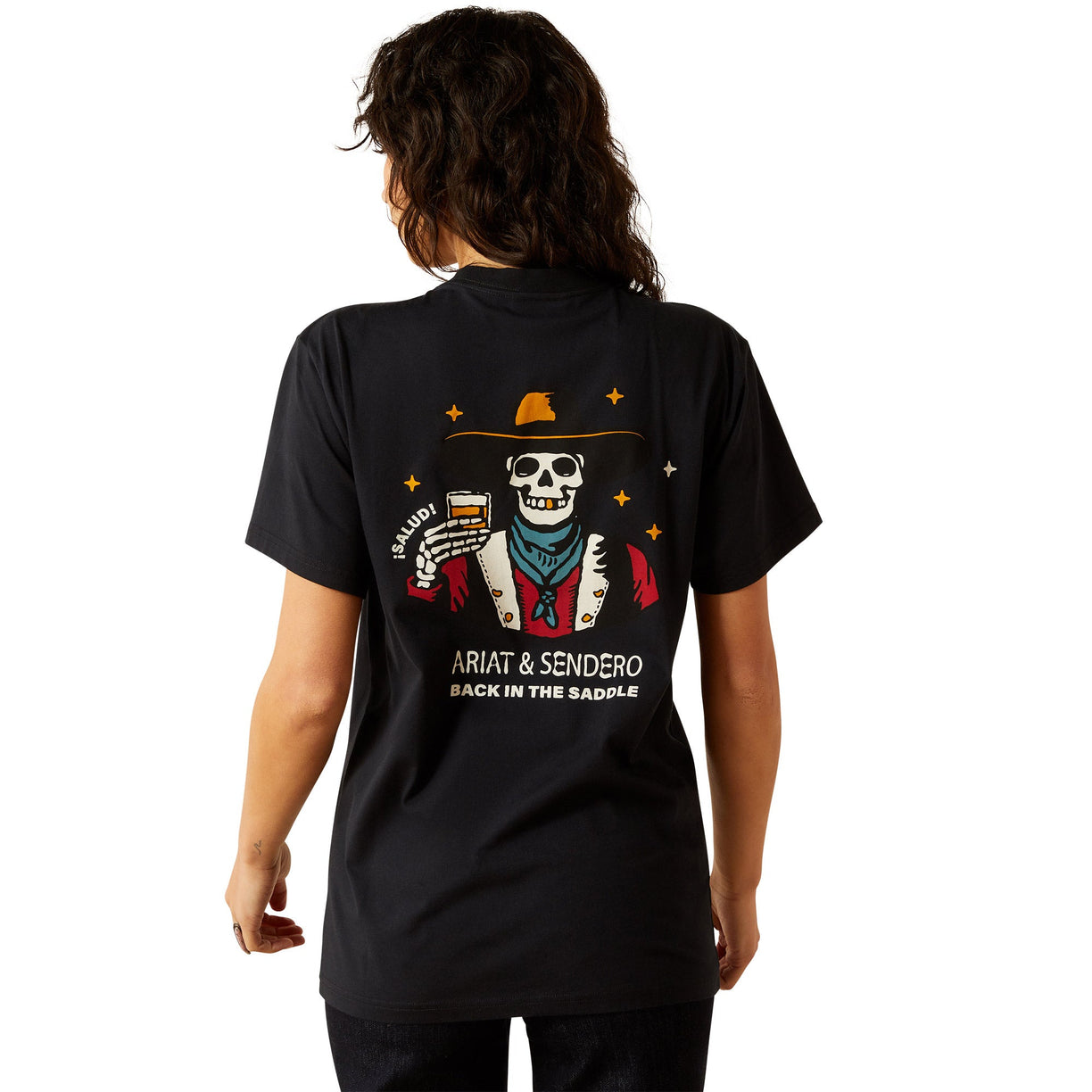 Person wearing a black t-shirt with a colorful graphic on the back, featuring text and a design.