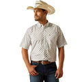 Man wearing a patterned shirt, jeans, and a cowboy hat on a white background