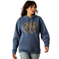 Woman wearing a blue hoodie with yellow text on a white background
