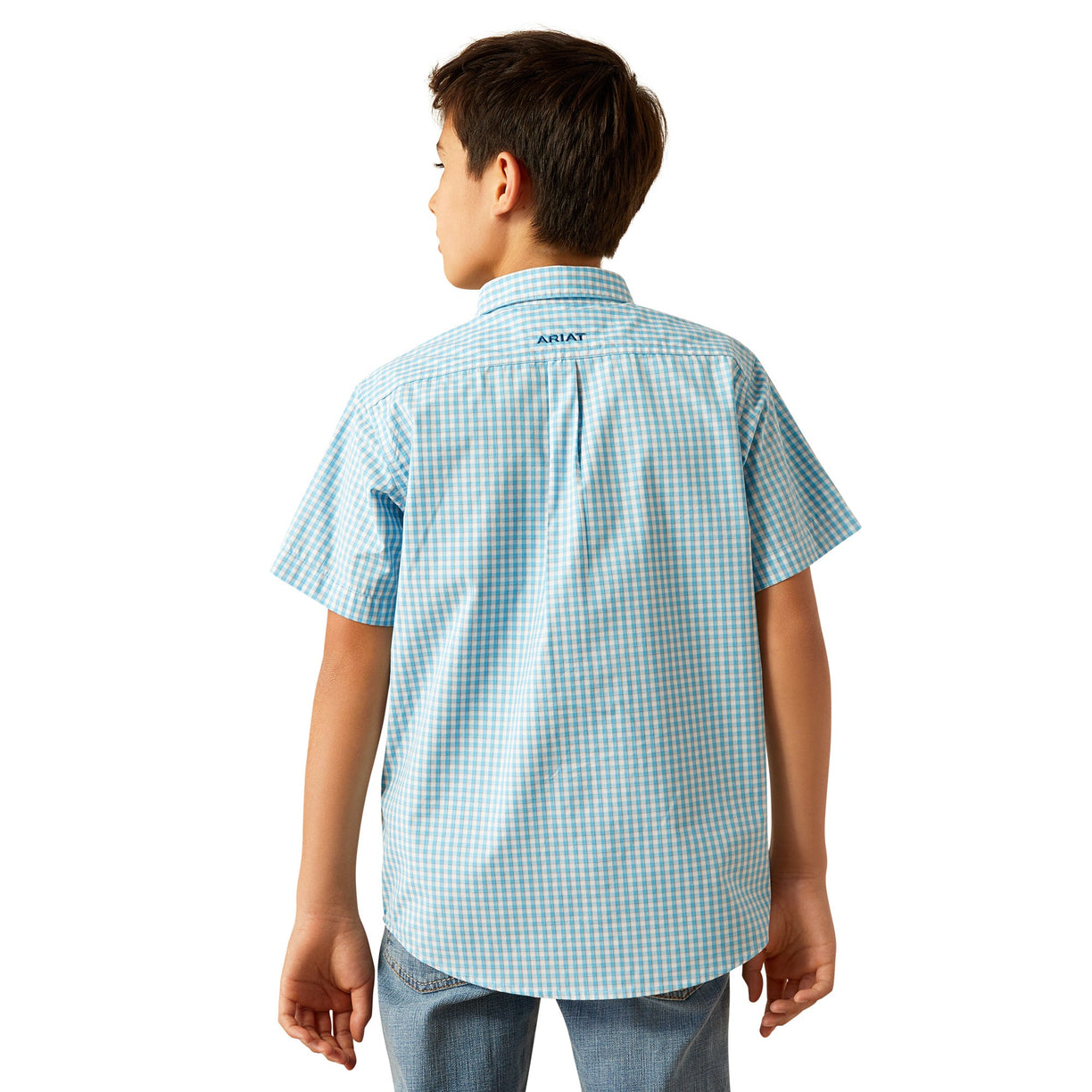 Child wearing a blue checkered shirt with a brand logo on the back, standing against a white background