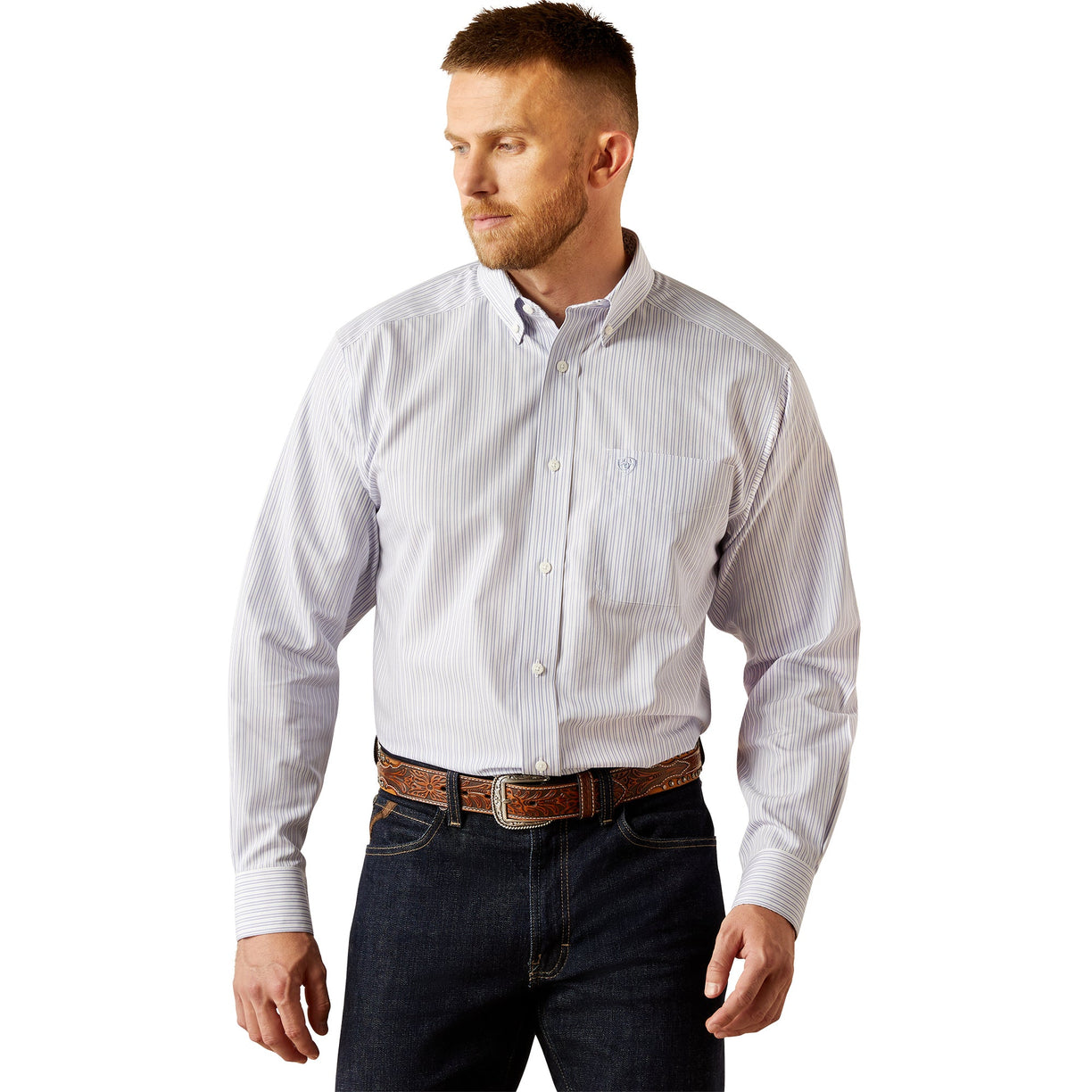 Man wearing a light blue striped shirt and dark jeans on a white background