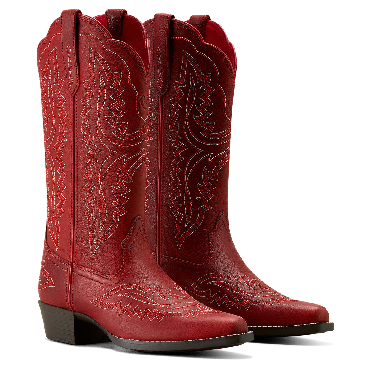 Red cowboy boot with intricate stitching on a white background