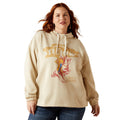 Woman wearing a beige hoodie with graphic design on a white background