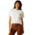 Person wearing a white t-shirt with a logo and brown pants on a white background