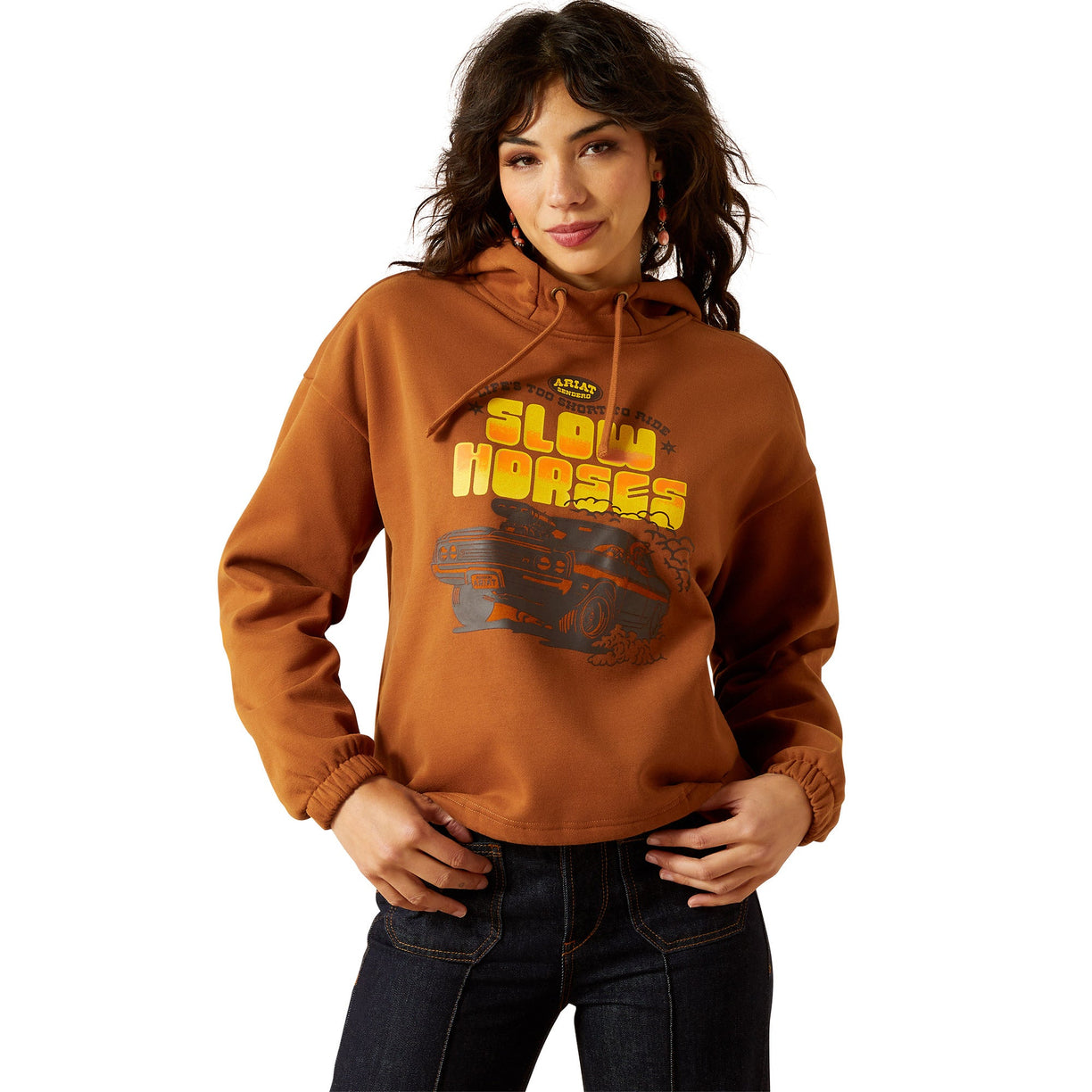 Woman wearing a brown hoodie with 'Slow Horses' text and graphic on a white background