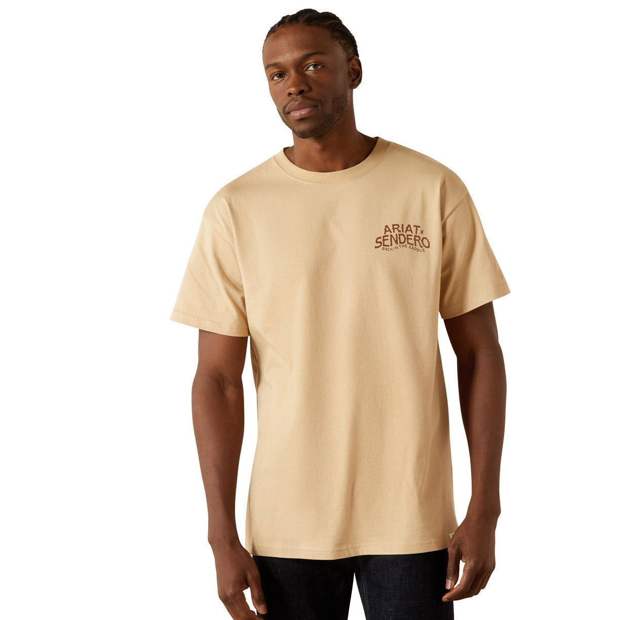 Man wearing a beige t-shirt with a logo on a white background