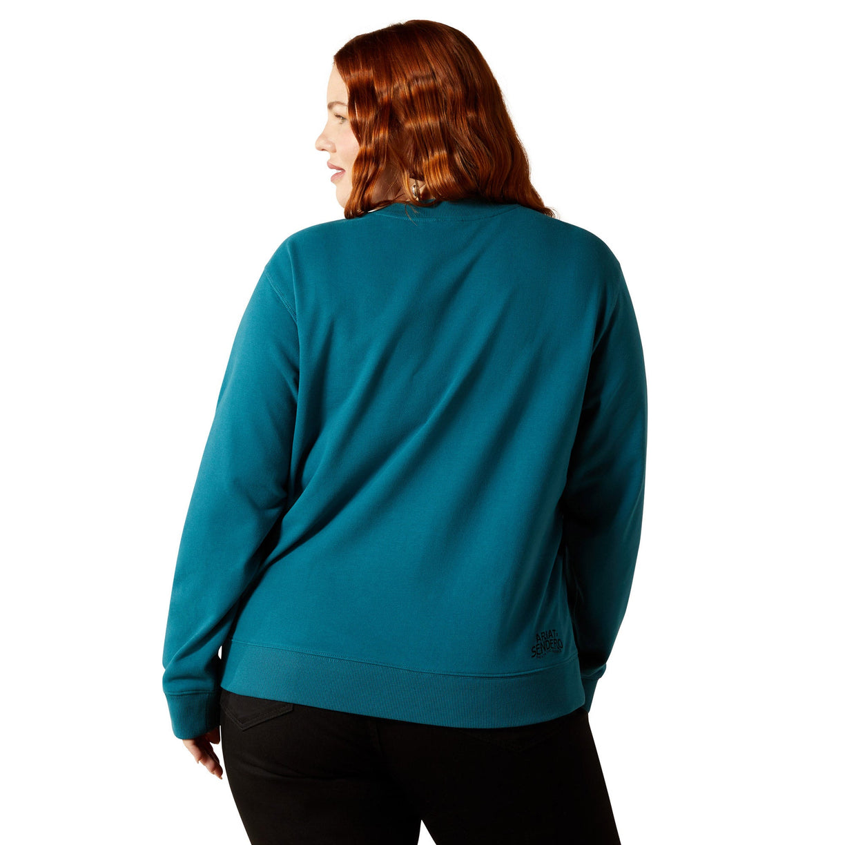 Person wearing a teal sweatshirt on a white background