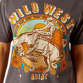 T-shirt with 'Wild West' and Ariat graphic design on a gray background