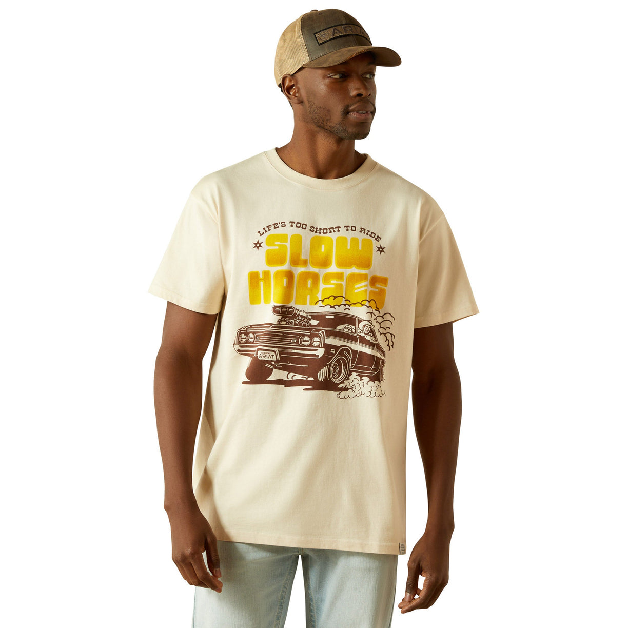 Man wearing a beige t-shirt with graphic design and text on a white background