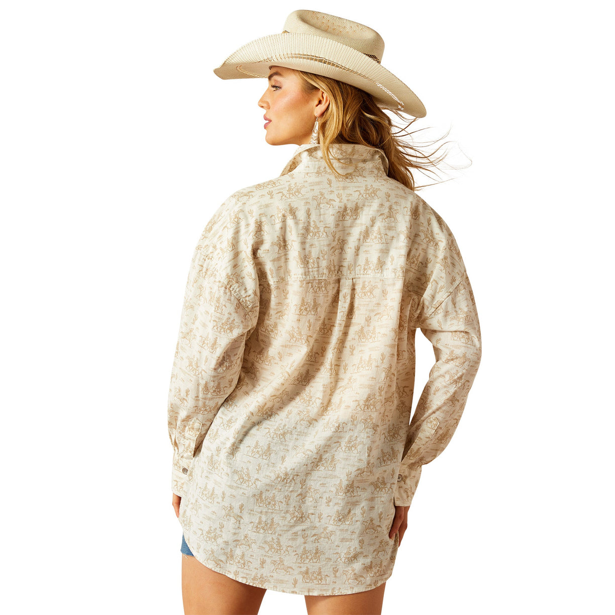 Woman wearing a beige patterned shirt and hat on a white background