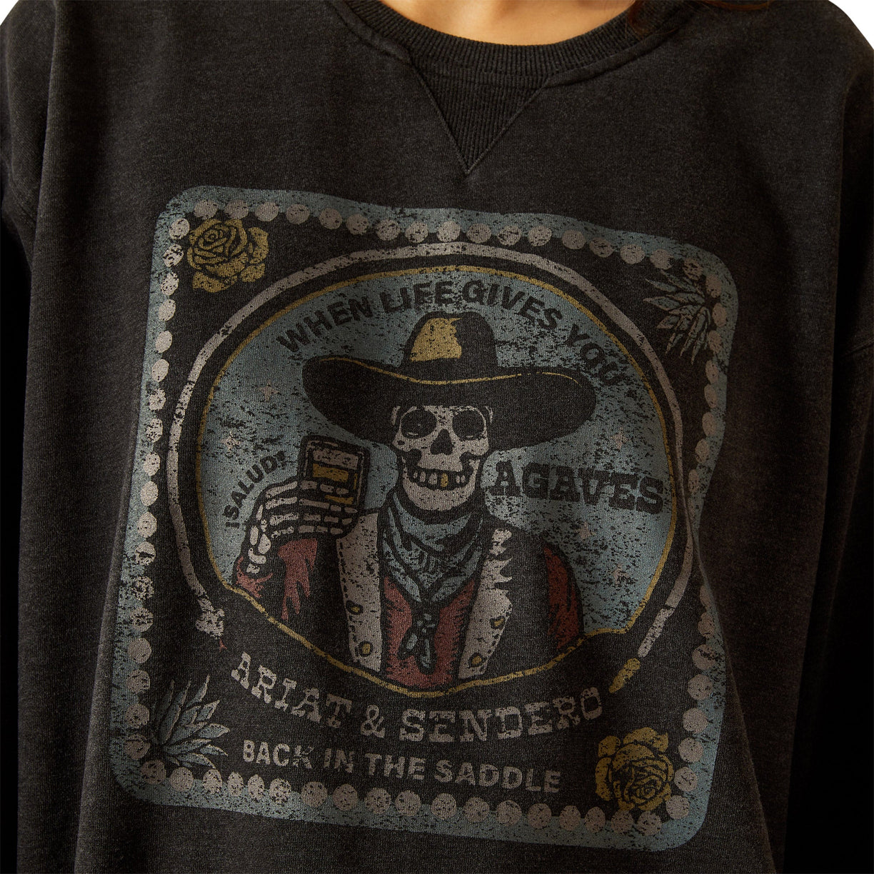 Dark gray hoodie with a graphic design featuring a skeleton in a cowboy hat and bandana, holding a bottle of tequila.