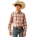 Child wearing a plaid shirt, jeans, and a cowboy hat on a white background
