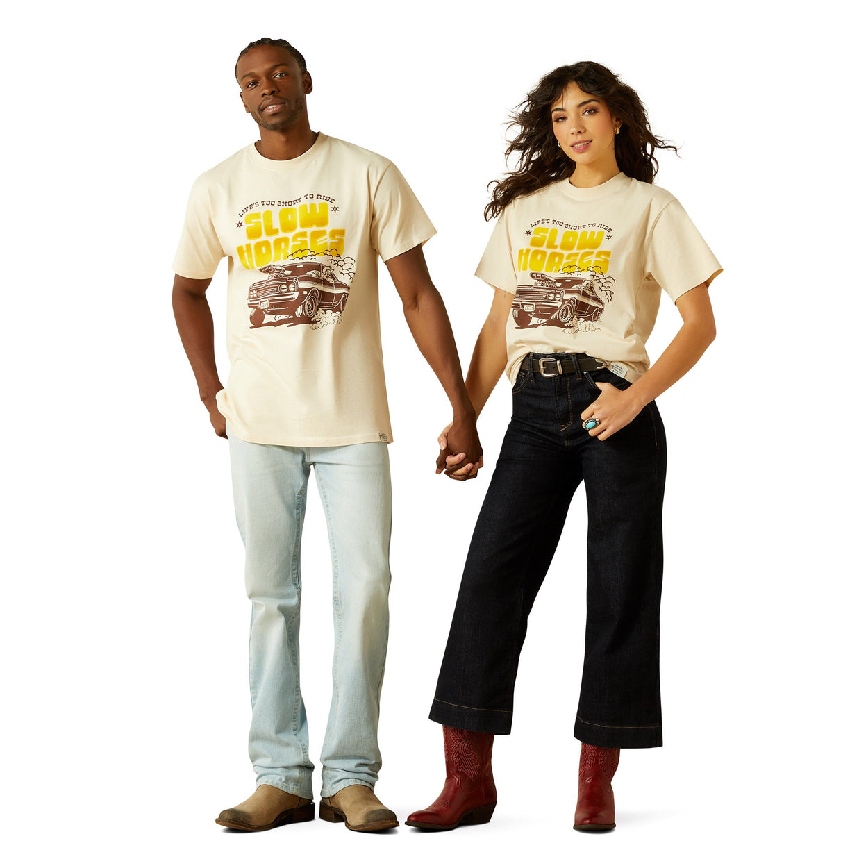Two people wearing matching graphic t-shirts on a white background